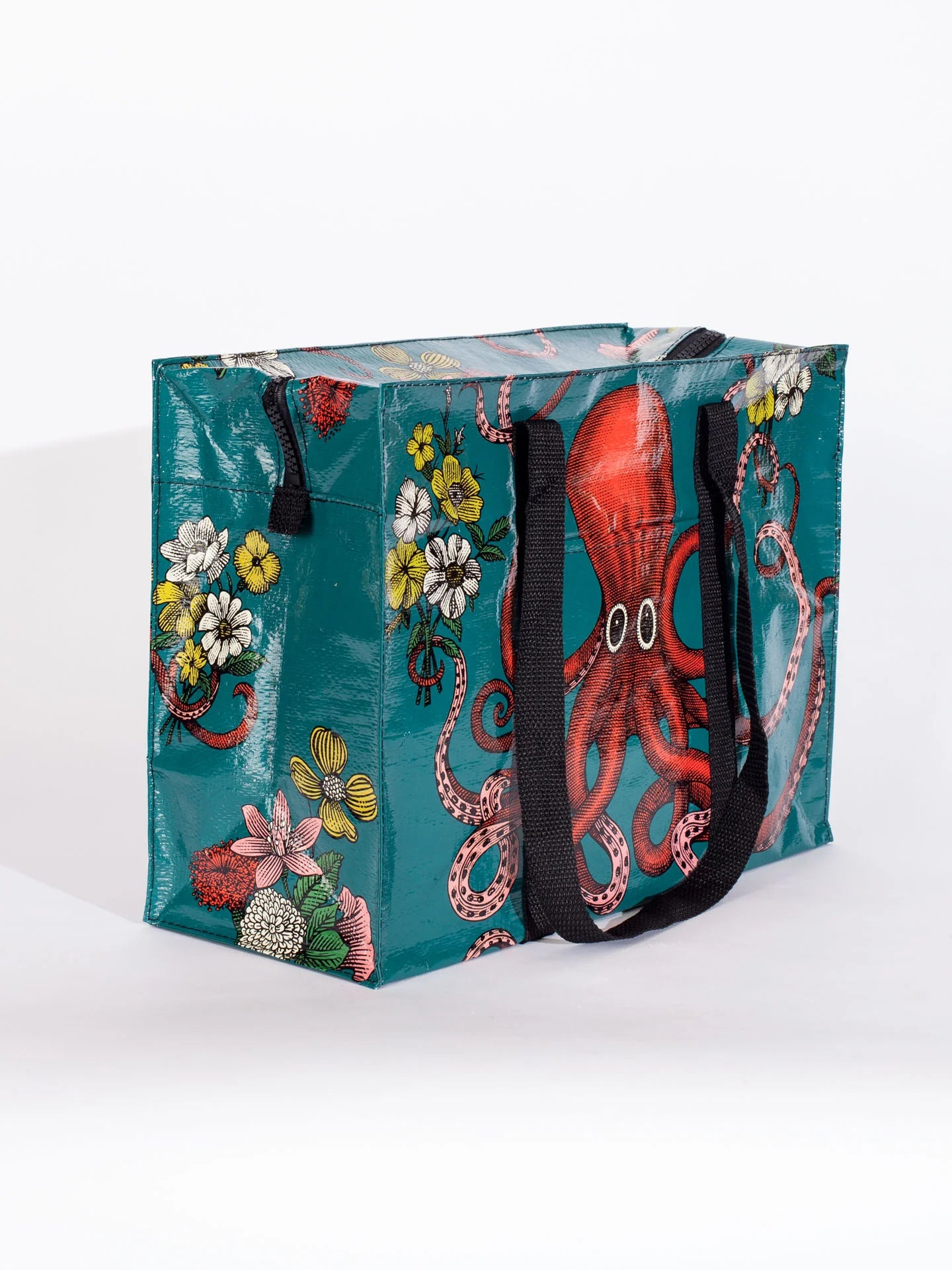 TEAL SHOULDER TOTE WITH AN OCTOPUS HOLDING TWO SMALL BOUQUETS OF YELLOW & WHITE WILD FLOWERS BY BLUE Q