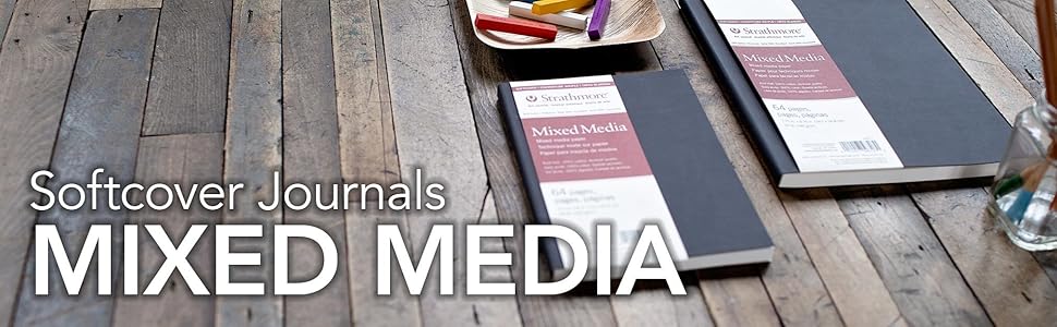 Two softcover journals on a wooden surface with text 'Softcover Journals MIXED MEDIA'.
